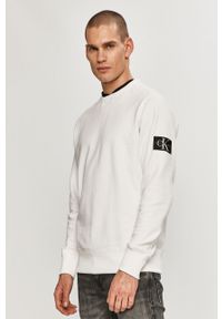 Calvin Klein Jeans - Bluza bawełniana. Okazja: na co dzień. Typ kołnierza: bez kaptura. Kolor: biały. Materiał: bawełna. Wzór: gładki. Styl: casual #1