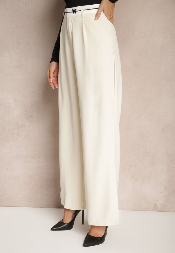 Renee - Beżowe Spodnie o Szerokim Kroju High Waist Wykończone Lamówką Verillia. Okazja: na spacer, na co dzień. Stan: podwyższony. Kolor: beżowy. Styl: elegancki, casual