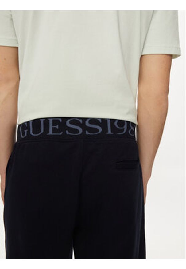 Guess Szorty materiałowe Clovis M4GD10 KBK32 Granatowy Loose Fit. Kolor: niebieski. Materiał: bawełna