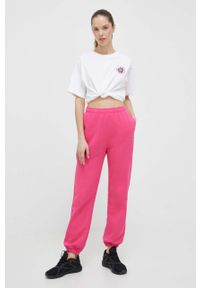 Champion spodnie dresowe kolor różowy gładkie. Kolor: różowy. Materiał: dresówka. Wzór: gładki #4
