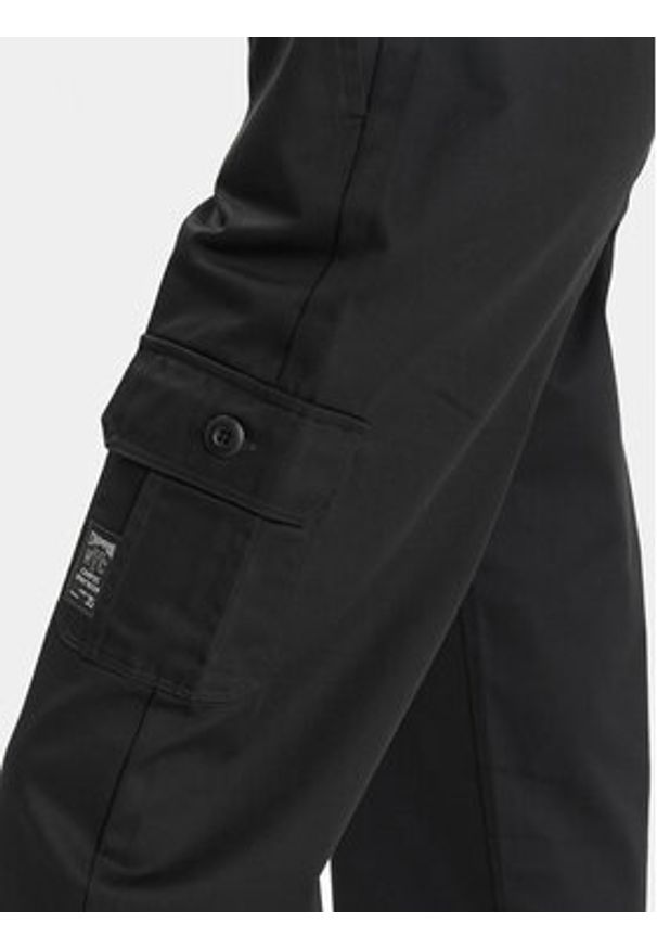 Champion Spodnie dresowe 117201 Czarny Relaxed Fit. Kolor: czarny. Materiał: bawełna, syntetyk