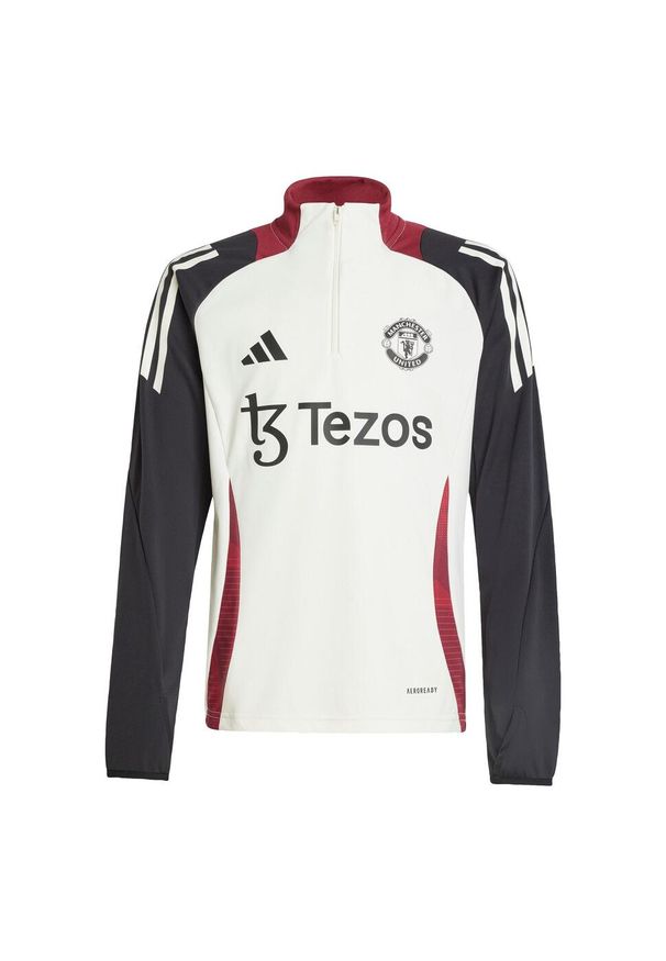 Adidas - Bluza Manchester United Tiro 24 Training Kids. Kolor: czarny, biały, wielokolorowy. Materiał: dresówka, materiał. Sport: piłka nożna