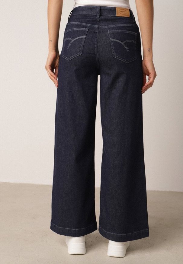 Born2be - Niebieskie Bawełniane Szerokie Jeansy z Wysokim Stanem Ozdobione Wiązaniem Lilinieth. Okazja: na co dzień. Stan: podwyższony. Kolor: niebieski. Wzór: aplikacja. Styl: klasyczny, casual