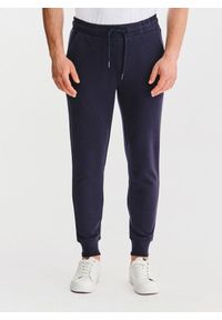 Pako Lorente - PAKO LORENTE – Granatowe spodnie dresowe. Okazja: na co dzień. Kolor: niebieski, szary. Materiał: dresówka. Wzór: gładki. Styl: casual #1