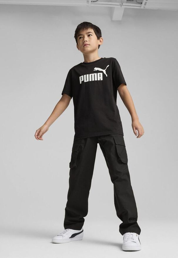 Puma - Młodzieżowa koszulka ESS z logo No. 1 PUMA Black. Kolor: czarny. Materiał: guma. Wzór: nadruk