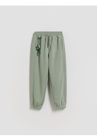 Reserved - Bawełniane spodnie jogger - jasnozielony. Kolor: zielony. Materiał: bawełna #1