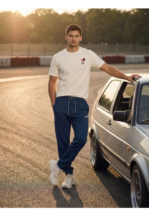 Sinsay - Spodnie dresowe jogger - niebieski. Kolor: niebieski. Materiał: dresówka