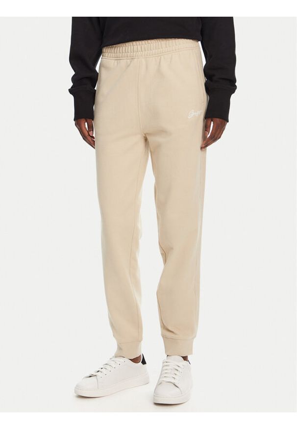 BOSS Spodnie dresowe 50540278 Beżowy Regular Fit. Kolor: beżowy. Materiał: dresówka