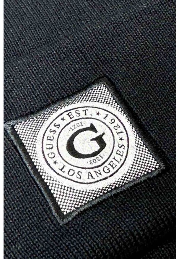 Guess - GUESS Czarna czapka Branded Beanie Washed. Kolor: czarny