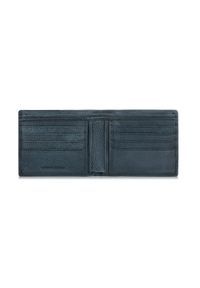 Ochnik - Granatowy skórzany portfel męski. Kolor: niebieski. Materiał: skóra