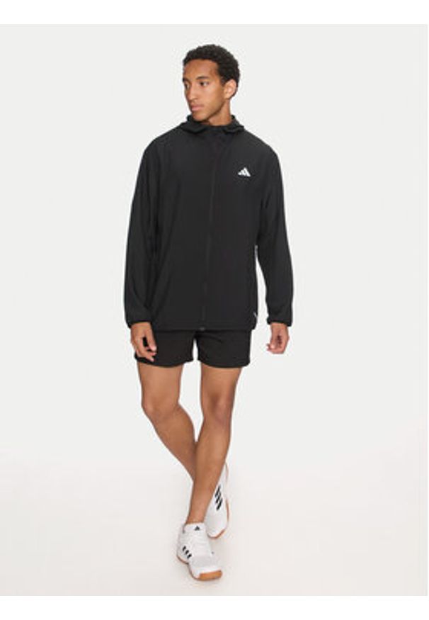 Adidas - adidas Kurtka do biegania Run It IL7230 Czarny Regular Fit. Kolor: czarny. Materiał: syntetyk. Sport: bieganie