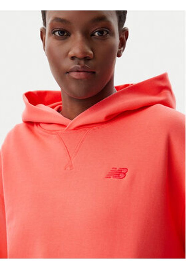 New Balance Bluza WT41537 Pomarańczowy Relaxed Fit. Kolor: pomarańczowy. Materiał: bawełna