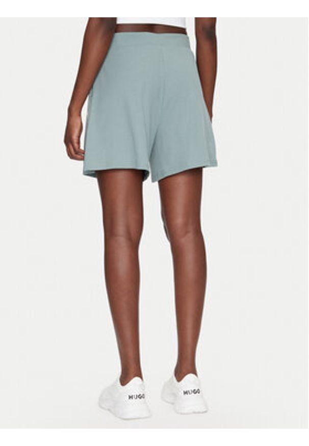 Puma Szorty sportowe ESS Elevated 5" 685026 Zielony Regular Fit. Kolor: zielony. Materiał: syntetyk