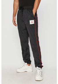 Jordan - Spodnie. Kolor: czarny. Materiał: tkanina, nylon, poliester. Wzór: aplikacja #3