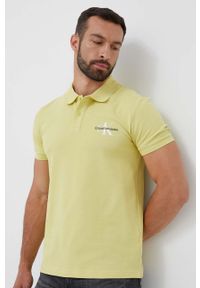 Calvin Klein Jeans polo męski kolor żółty z nadrukiem. Typ kołnierza: polo. Kolor: żółty. Materiał: dzianina. Długość: krótkie. Wzór: nadruk #1