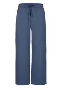 Volcano - Szerokie spodnie dresowe N-EVA. Kolor: niebieski. Materiał: dresówka. Długość: długie. Wzór: gładki #1