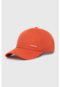 Calvin Klein czapka z daszkiem bawełniana kolor pomarańczowy z aplikacją. Kolor: pomarańczowy. Materiał: bawełna. Wzór: aplikacja #1