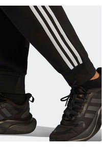 Adidas - adidas Spodnie dresowe Future Icons 3-Stripes Regular Tracksuit Bottoms HT4704 Czarny Regular Fit. Kolor: czarny. Materiał: bawełna #4
