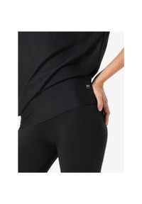 Koszulka z krótkim rękawem damska SUPER.NATURAL Yoga Loose Tee. Kolor: czarny. Długość rękawa: krótki rękaw. Długość: krótkie. Sport: fitness #2