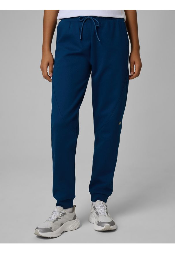 4f - 4F Spodnie dresowe joggery damskie - turkusowe XXL. Kolor: turkusowy. Materiał: dresówka