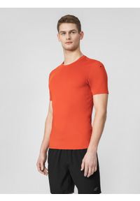4f - Koszulka treningowa slim szybkoschnąca męska. Kolor: pomarańczowy. Materiał: dzianina, materiał. Sport: fitness #1