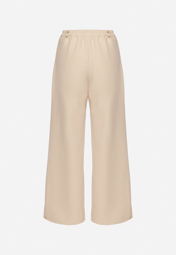 Born2be - Beżowe Garniturowe Spodnie z Wysokim Stanem Vivisora. Stan: podwyższony. Kolor: beżowy. Wzór: aplikacja