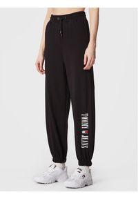 Tommy Jeans Spodnie dresowe Archive DW0DW14994 Czarny Relaxed Fit. Kolor: czarny. Materiał: bawełna, dresówka #1