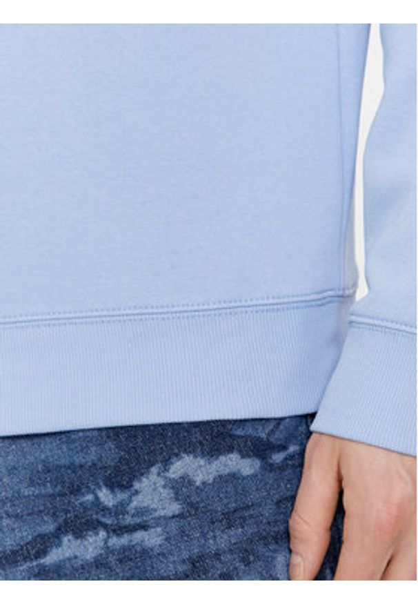 Tommy Jeans Bluza DM0DM09591 Błękitny Regular Fit. Kolor: niebieski. Materiał: bawełna, syntetyk