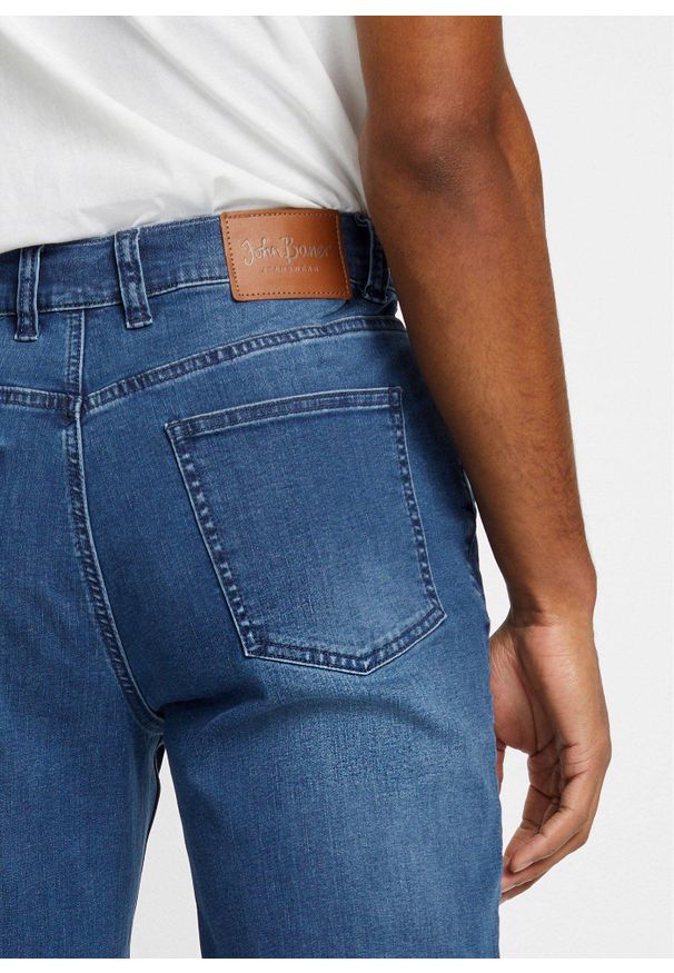 bonprix - "Dżinsy ""power-stretch""T-400, w wygodnym fasonie, Classic Fit Tapered". Kolor: niebieski