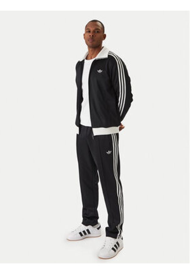 Adidas - adidas Spodnie dresowe Classic KE3530 Czarny Slim Fit. Kolor: czarny. Materiał: syntetyk