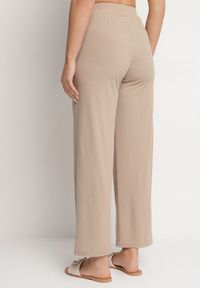 Born2be - Ciemnobeżowe Prążkowane Spodnie Szerokie z Gumką w Pasie Drasia. Kolor: beżowy. Materiał: prążkowany #6