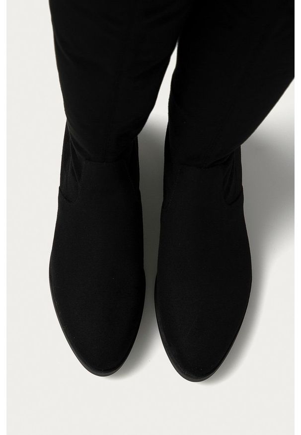 Steve Madden - Kozaki. Kolor: czarny. Materiał: guma. Szerokość cholewki: normalna. Obcas: na obcasie. Wysokość obcasa: średni