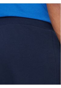 Adidas - adidas Spodnie dresowe adicolor Trefoil IP2757 Granatowy Slim Fit. Kolor: niebieski. Materiał: bawełna