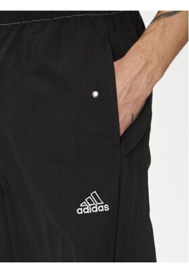 Adidas - adidas Spodnie dresowe Parachute JD5415 Czarny Loose Fit. Kolor: czarny. Materiał: syntetyk