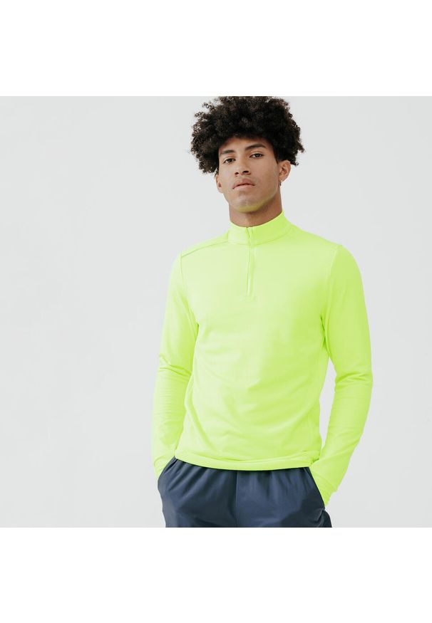 KIPRUN - Bluza do biegania męska Kalenji Run 100 Warm Visibilite. Kolor: żółty, zielony. Materiał: poliester, materiał, elastan. Wzór: kolorowy. Sport: bieganie