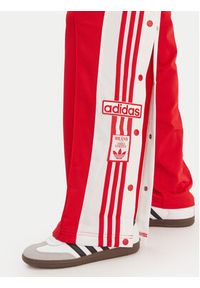 Adidas - adidas Spodnie dresowe Adibreak KD6324 Czerwony Loose Fit. Kolor: czerwony. Materiał: syntetyk #5