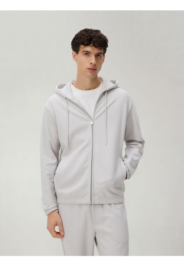 Reserved - Rozpinana bluza z kapturem - jasnoszary. Kolor: szary. Materiał: dzianina, bawełna