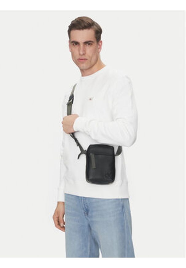 Calvin Klein Jeans Saszetka Cargo Reporter Bag LV04G3080G Czarny. Kolor: czarny. Materiał: skóra