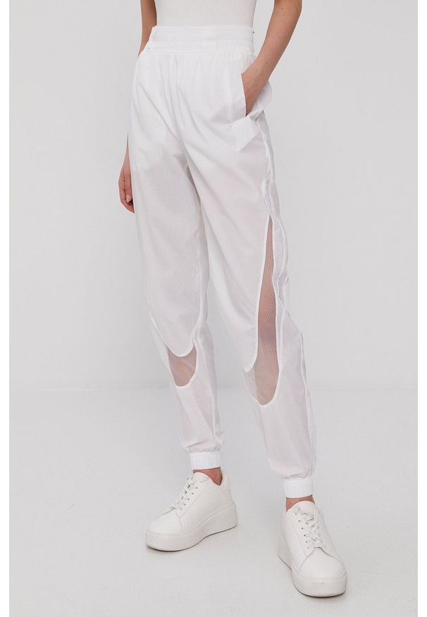 Nike Sportswear - Spodnie. Kolor: biały. Materiał: tkanina