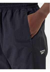 Reebok Spodnie dresowe Vector 100221435 Czarny Relaxed Fit. Kolor: czarny. Materiał: syntetyk #4