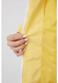 Tommy Jeans kurtka damska kolor żółty przejściowa. Kolor: żółty. Materiał: poliamid