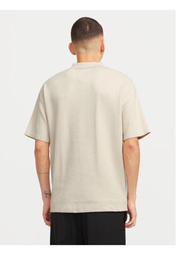 Jack & Jones Polo Troy 12269617 Beżowy Relaxed Fit. Typ kołnierza: polo. Kolor: beżowy. Materiał: bawełna