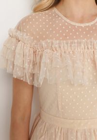 Born2be - Beżowa Sukienka z Przezroczystego Materiału Rozkloszowana Ozdobiona Koronką Pela. Okazja: na co dzień. Kolor: beżowy. Materiał: materiał, koronka. Długość rękawa: krótki rękaw. Wzór: aplikacja, koronka. Typ sukienki: rozkloszowane, proste. Styl: casual, klasyczny #5