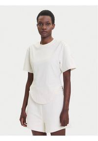 Adidas by Stella McCartney - adidas by Stella McCartney T-Shirt JX6775 Beżowy Regular Fit. Kolor: beżowy. Materiał: bawełna