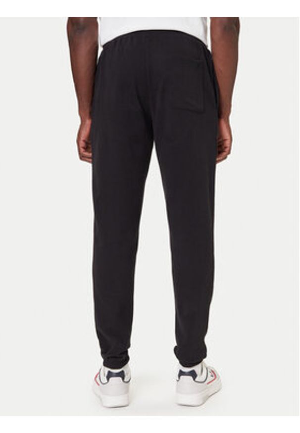 Tommy Jeans Spodnie dresowe DM0DM22094 Czarny Relaxed Fit. Kolor: czarny. Materiał: bawełna