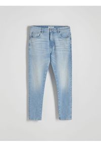 Reserved - Jeansy slim fit z efektem sprania - niebieski. Kolor: niebieski #1