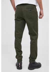 Sisley Spodnie męskie kolor zielony joggery. Okazja: na co dzień. Kolor: zielony. Materiał: tkanina. Wzór: gładki. Styl: casual #2