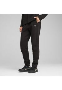 Puma - Damskie spodnie dresowe EVOSTRIPE PUMA Black. Kolor: czarny. Materiał: dresówka. Sport: turystyka piesza