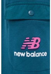New Balance Spodnie MP13552MTL męskie z nadrukiem. Kolor: niebieski. Wzór: nadruk #3