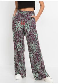 bonprix - Spodnie z szerokimi nogawkami. Kolor: fioletowy. Materiał: materiał. Wzór: nadruk #1